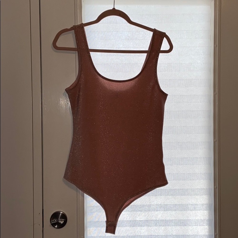 Sparkly pink bodysuit